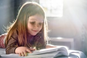 little girl reading