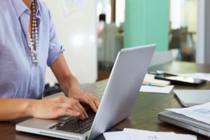 Women writing on a keyboard